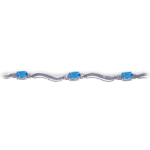 Rhythmic Flow Diamond And Blue Topaz bracelet