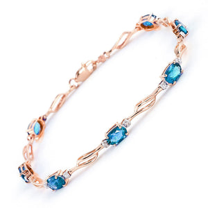 Shimmering Array Blue Topaz And Diamond Bracelet