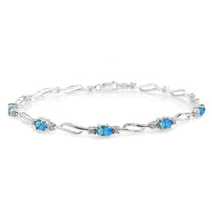Shimmering Array Blue Topaz And Diamond Bracelet