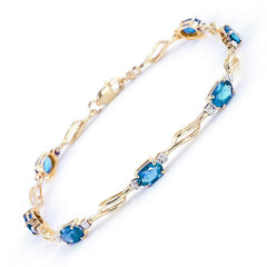 Shimmering Array Blue Topaz And Diamond Bracelet