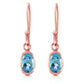 Swaying Silhouette Blue Topaz Earrings