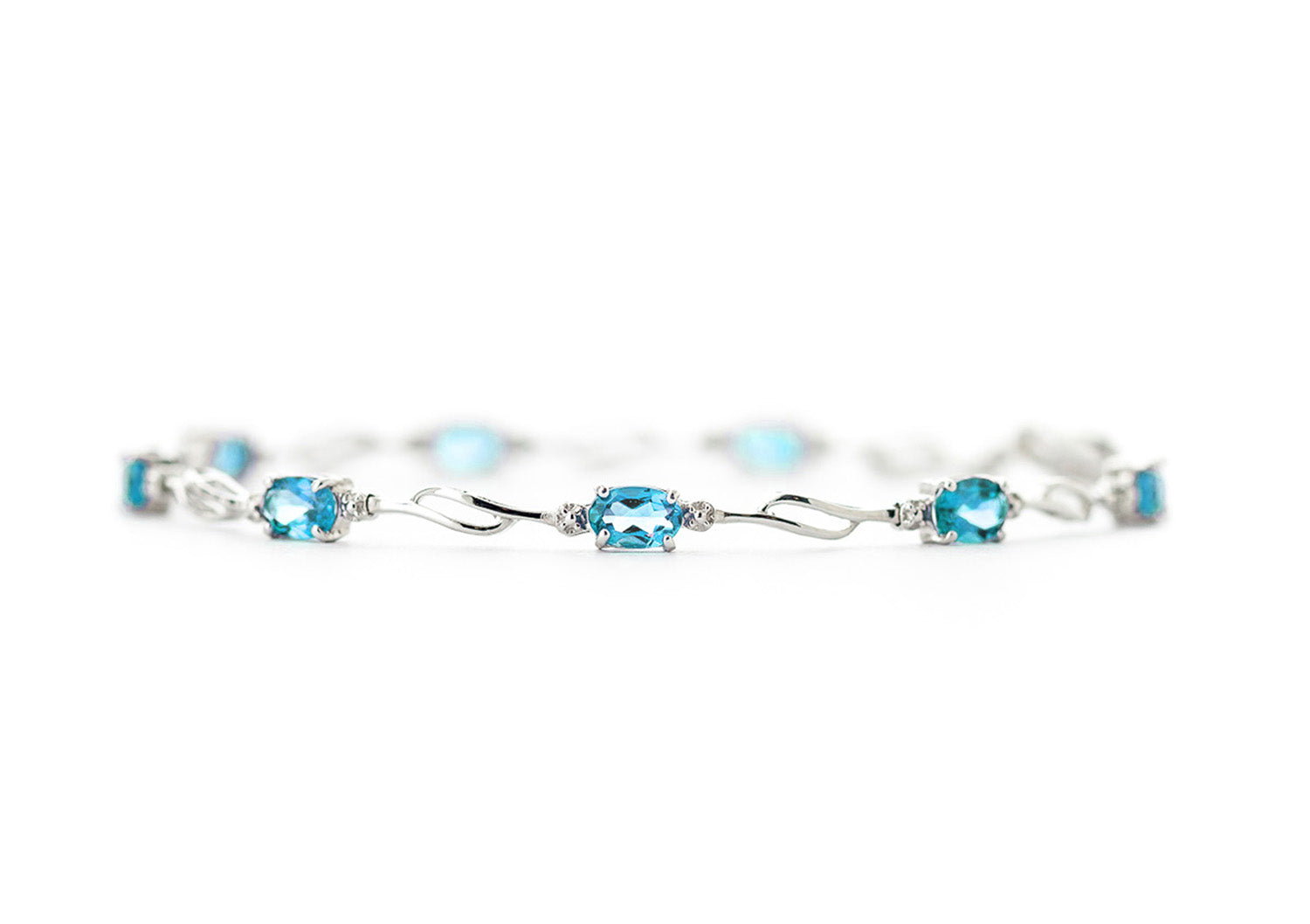 Shimmering Array Blue Topaz And Diamond Bracelet