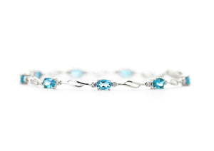 Shimmering Array Blue Topaz And Diamond Bracelet