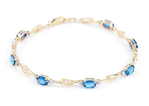 Shimmering Array Blue Topaz And Diamond Bracelet