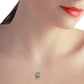 Radiant Orb Blue Topaz Necklace